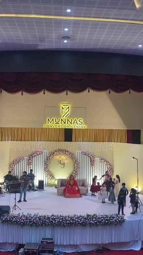 The grand hall at golden hour, set for a Malabar wedding reception